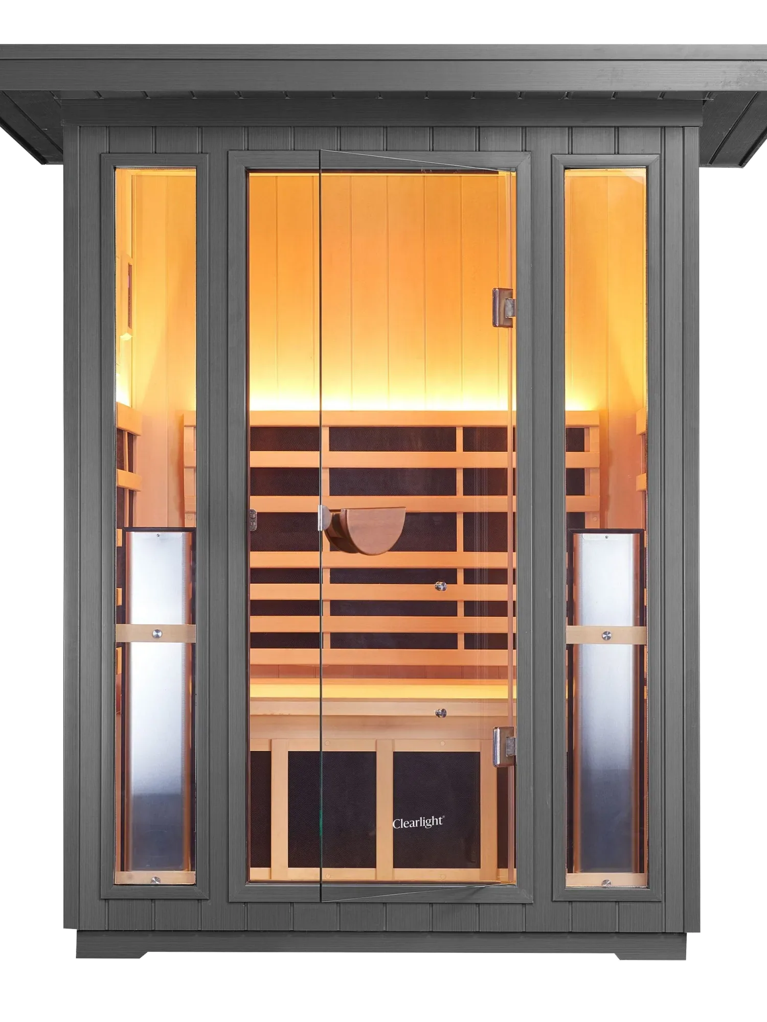 A Clearlight Sanctuary Outdoor 2 infrared sauna, dark cladding, glass front, interior lit.