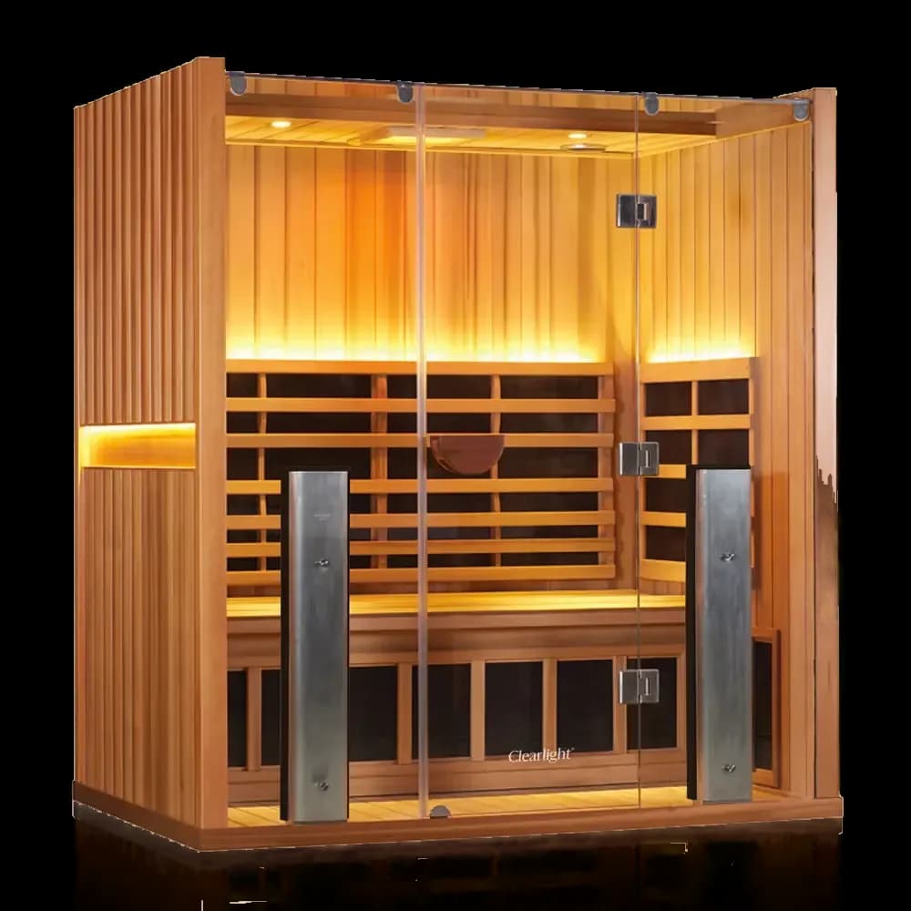 Clearlight Sanctuary 3 infrared sauna in reddish wood, full glass front and warm amber interior lighting