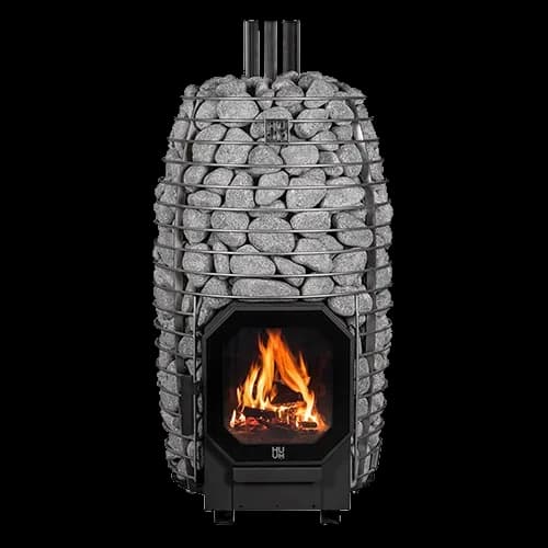 HUUM HIVE Flow wood burning sauna stove on white, stone cage full, flue pipe on top and a fire behind the octagonal glass door