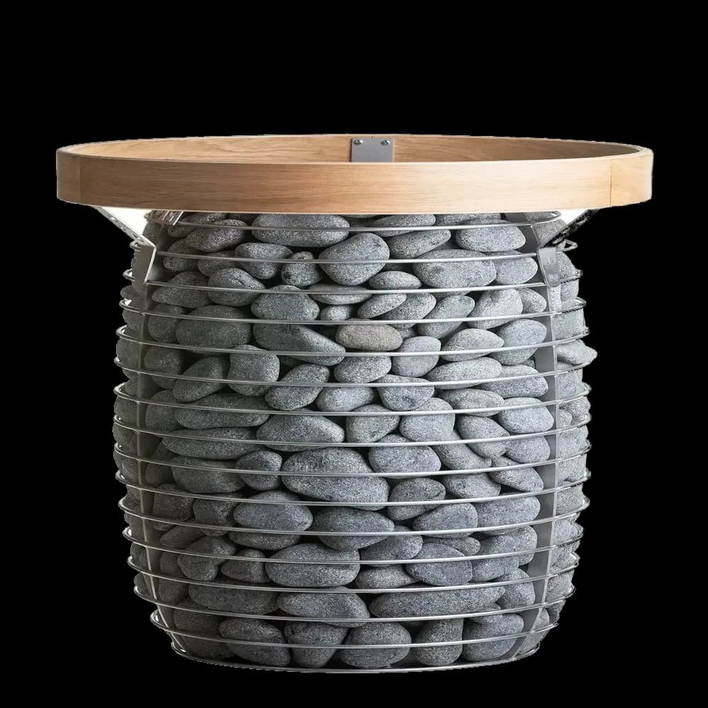 HUUM's studio image of the HUUM HIVE heater, grey stones in a steel bar cage under a round oak rim. A floor-standing heater from the same maker, not the HUUM STEEL.